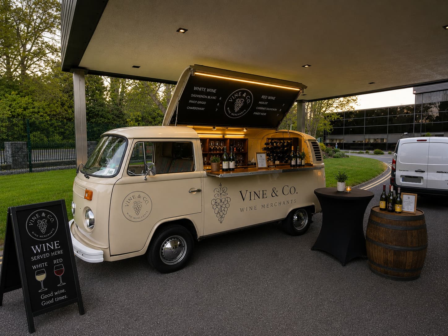 Cream VW T2 wine bar truck Vine and Co with elegant wooden interior and barrel table